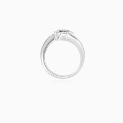 White gold bezel cubic zircon ring with accent zircons