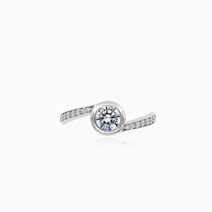 White gold cubic zircon ring with accent zircons