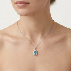 White Gold Blue Topaz and Diamond Pendant