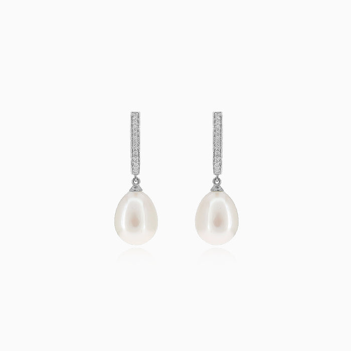 White gold diamond and pearl dangling earrings