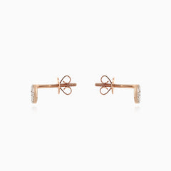 Gold stud earrings with  diamonds in round cut