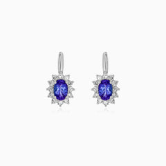 White gold tanzanite and diamond halo earrings