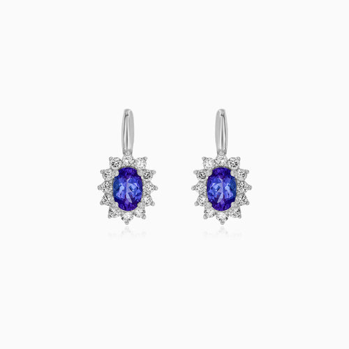 White gold tanzanite and diamond halo earrings