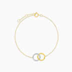 Gold bracelet with interlocking circles and diamonds