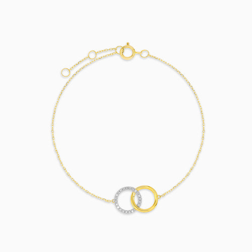 Gold bracelet with interlocking circles and diamonds