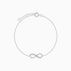 White gold infinity bracelet with diamonds