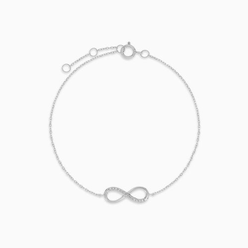White gold infinity bracelet with diamonds