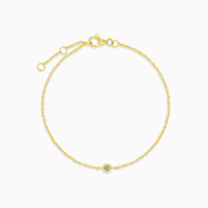 Yellow gold bracelet with a bezel-set diamond