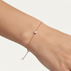 Rose gold bracelet with a bezel-set diamond