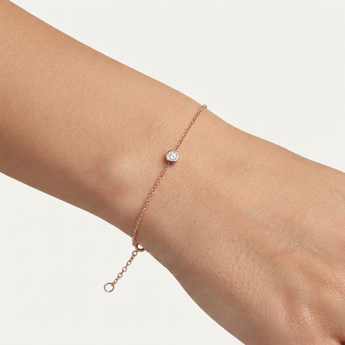 Rose gold bracelet with a bezel-set diamond