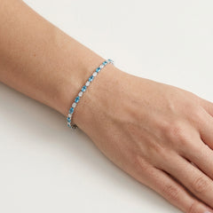 White gold bracelet with blue topaz and diamonds