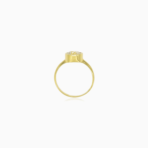 Yellow gold bezel set lustrous ring