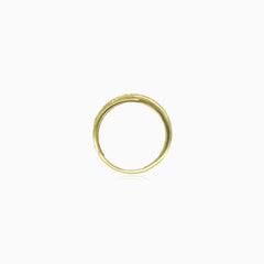 Yellow gold ring with diagonal cubic zirconia