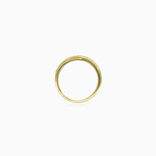 Yellow gold ring with diagonal cubic zirconia