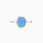 Oval cut blue opal white gold ring