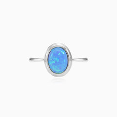 Oval cut blue opal white gold ring