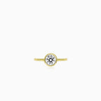 Yellow gold bezel set lustrous ring