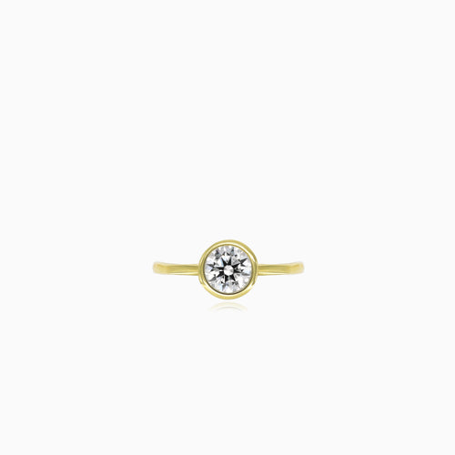 Yellow gold bezel set lustrous ring