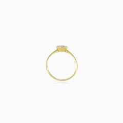 Yellow gold bezel set lustrous ring