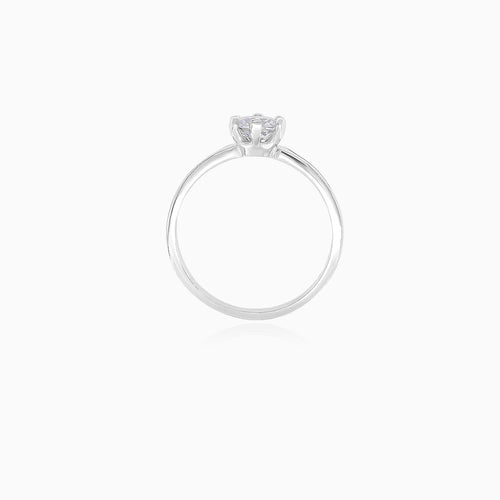 White gold ring with cubic zircon and zircon along