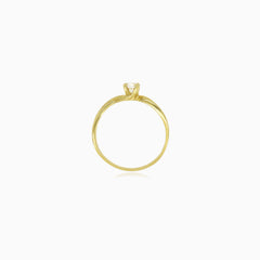 Yellow gold solitaire cubic zirconia ring