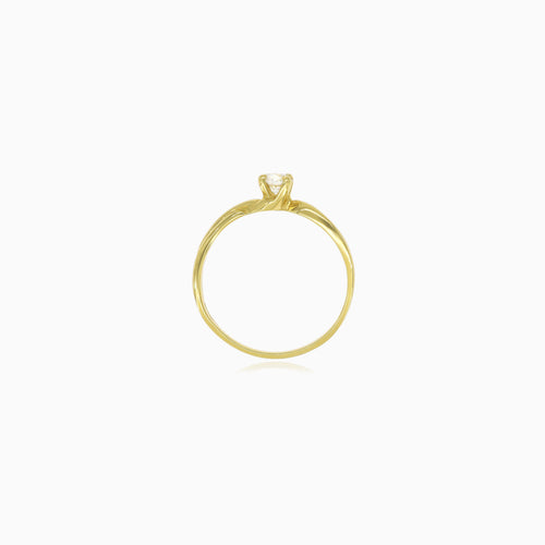 Yellow gold solitaire cubic zirconia ring