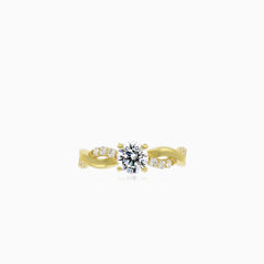 Yellow gold ring with wave shaped design