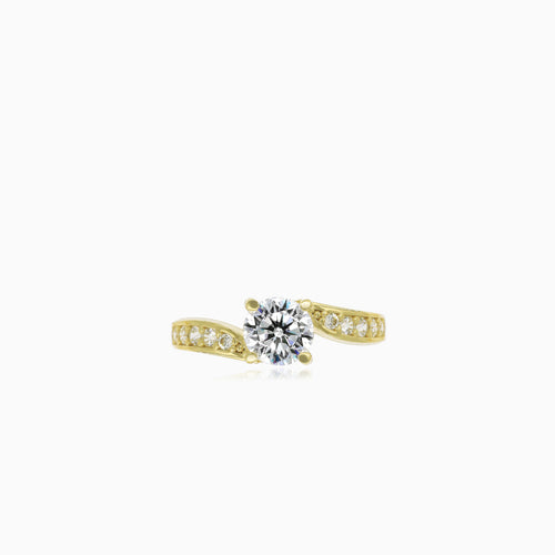 Yellow gold asymmetrical ring with cubic zirconia