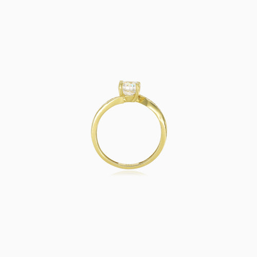 Yellow gold asymmetrical ring with cubic zirconia