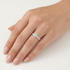 White Gold Solitaire Ring With Pavé Shoulders