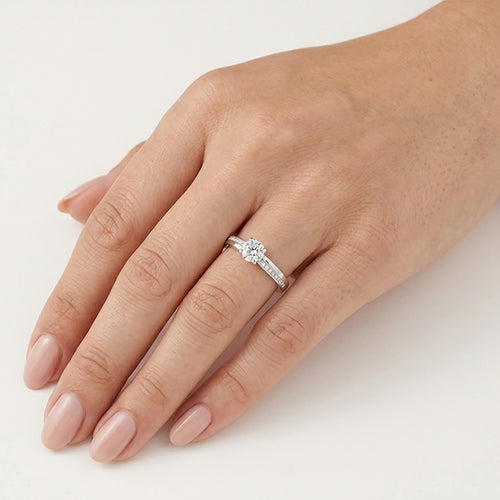 White Gold Solitaire Ring With Pavé Shoulders