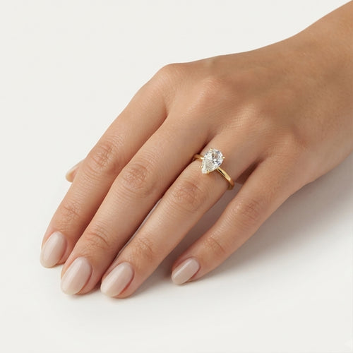 Yellow Gold Pear-Cut Zirconia Solitaire Ring