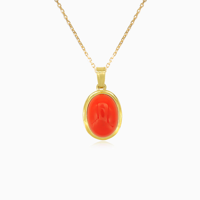 Elegant yellow gold coral cabochon pendant