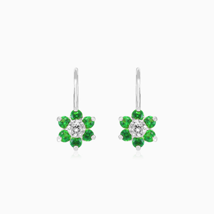 Boucles d’oreilles pendantes fleur avec accent émeraude