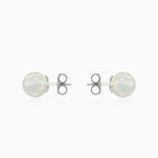 White opal stud earrings in gold