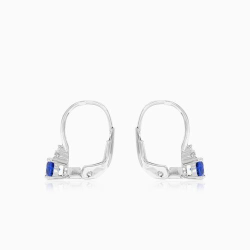 White gold sapphire earrings with zirconia trio