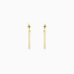 Women gemstone dangling earrings in yellow gold