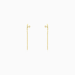 Women gemstone dangling earrings in yellow gold