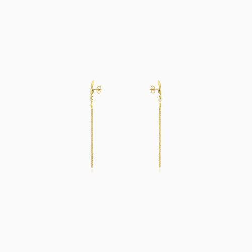 Women gemstone dangling earrings in yellow gold