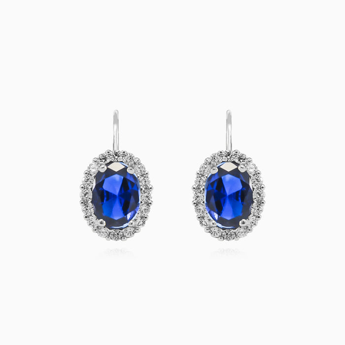 Boucles d’oreilles pendantes en or blanc avec saphir
