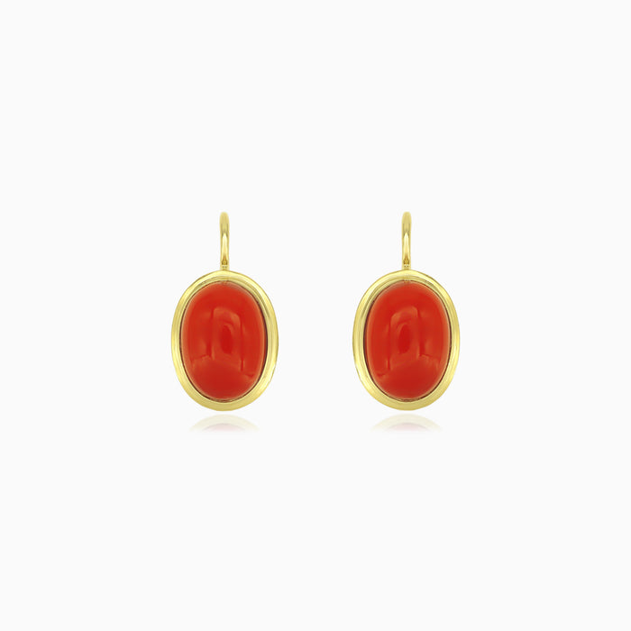 Elegant yellow gold coral cabochon drop earrings