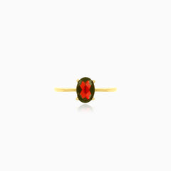 Yellow gold ring with oval garnet