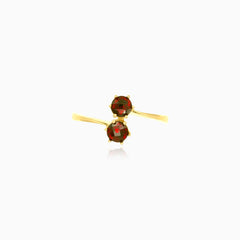 Yellow gold ring with two garnet balls