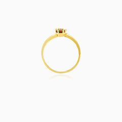 Yellow gold ring with two garnet balls