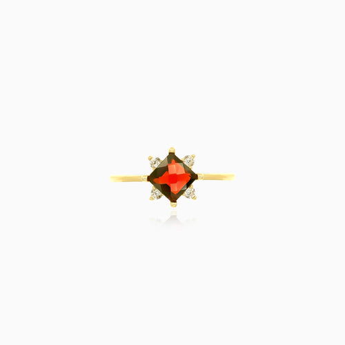 Gold ring with garnet and cubic zirconia