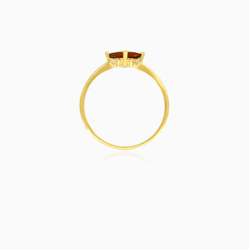 Gold ring with garnet and cubic zirconia