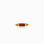 Gold ring with round and rectangular garnets