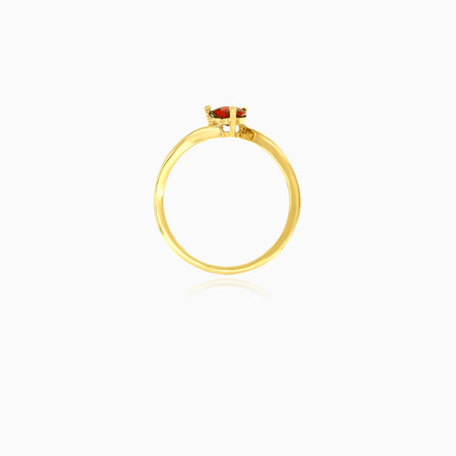 Heart-shaped garnet ring in yellow gold