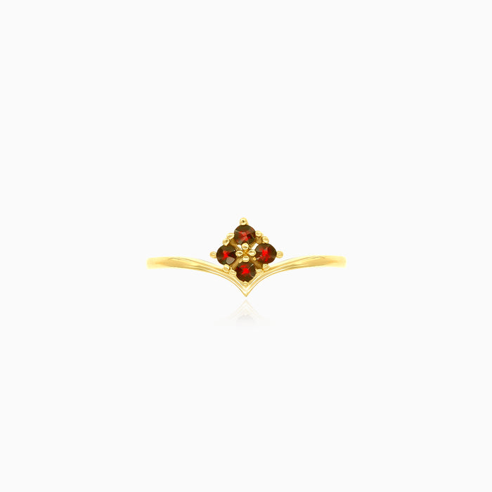 Anillo de oro amarillo con cuatro granates