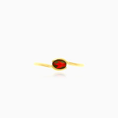 Oval cut garnet ring in semi bezel setting